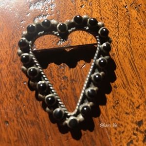Silver and black stone heart brooch